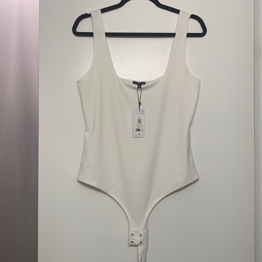 Dynamite White tank bodysuit